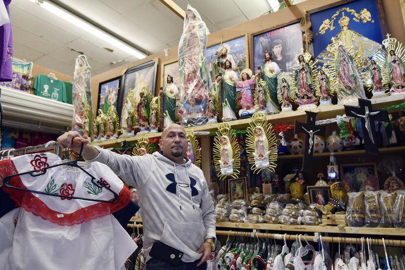 José Cruz y su colección de estatuas de la Virgen de Guadalupe en su tiena “Todo México” en...
