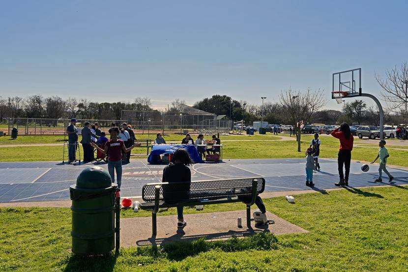 Kids played basketball during the Census Fun Day at Jaycee Zaragoza Park Pavilion in Dallas...
