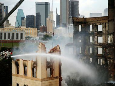 A wrecking crew demolishes the historic Ambassador Hotel after it was gutted by a four-alarm...