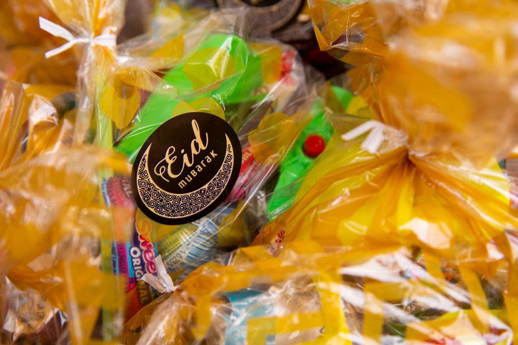 Goody bags were passed out at Abdul Hayee and Qudsia Nadeem's drive-thru Eid at their home...