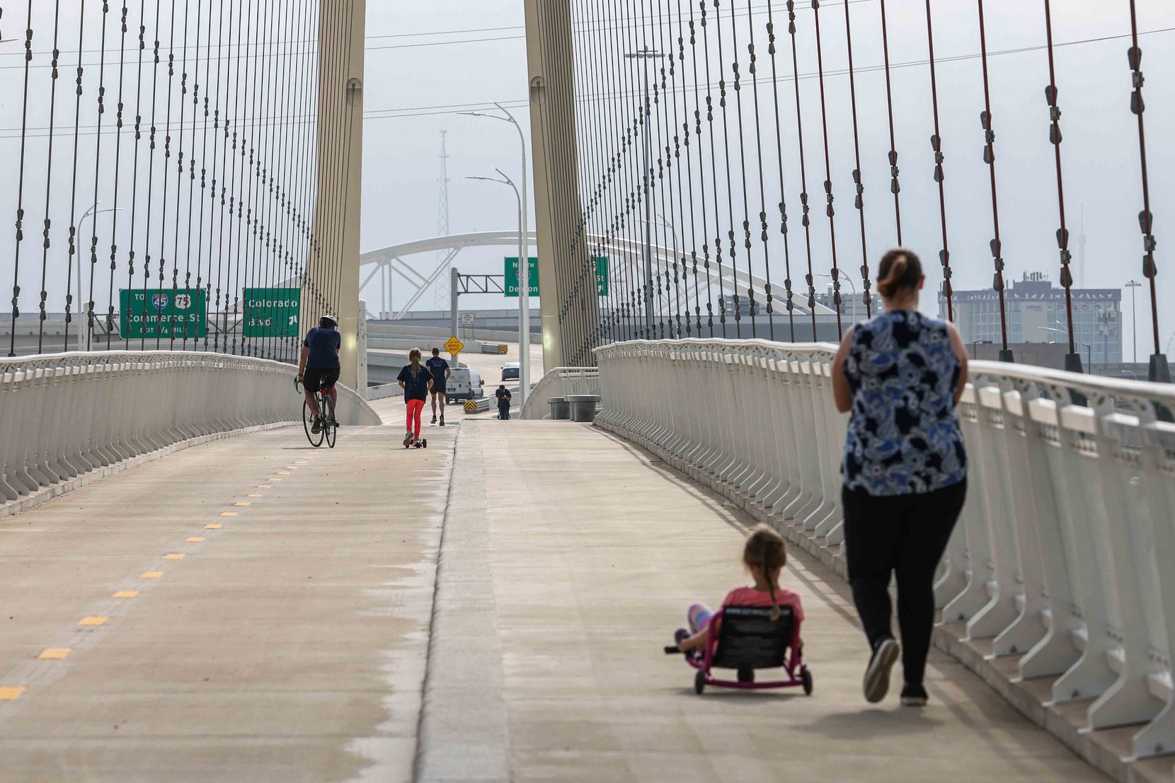 People tried out the pedestrian and bicycle lanes Thursday.