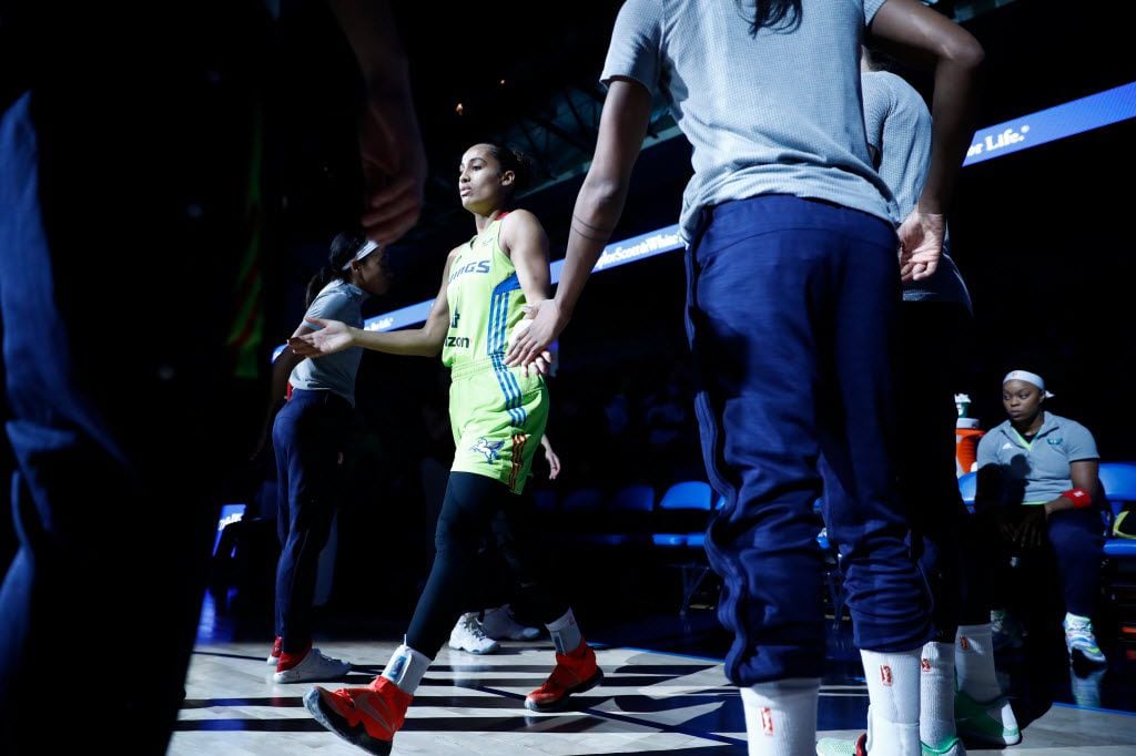 Dallas Wings guard Skylar Diggins (4) being introduced onto the court before a WNBA...