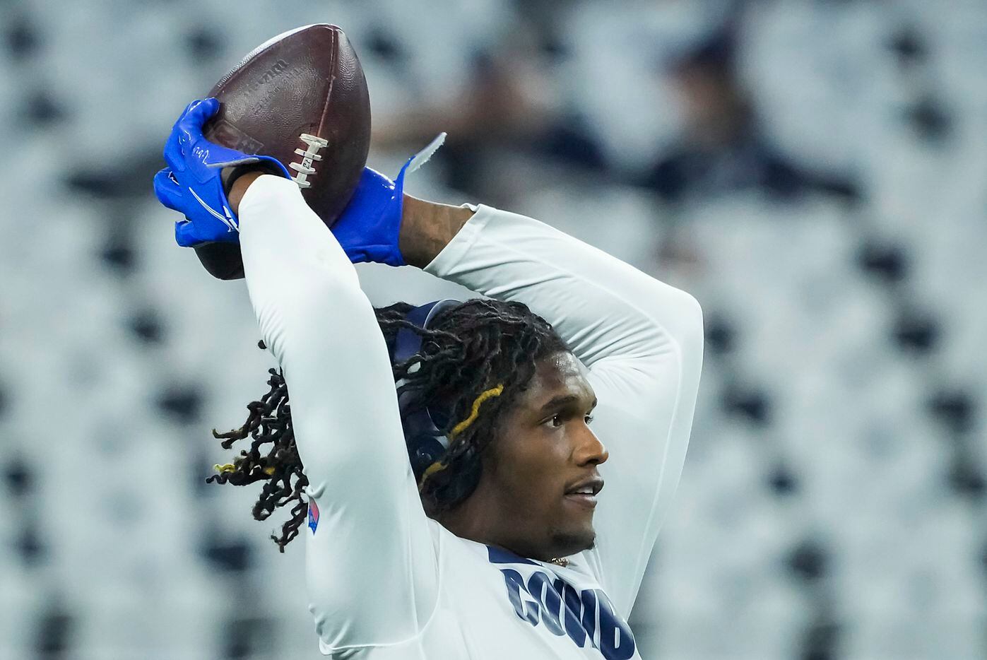 Dallas Cowboys wide receiver CeeDee Lamb warms up before an NFL football game against the...