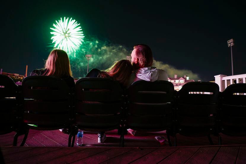 Fans watch the post game fireworks after the Frisco RoughRiders game at Riders Field....