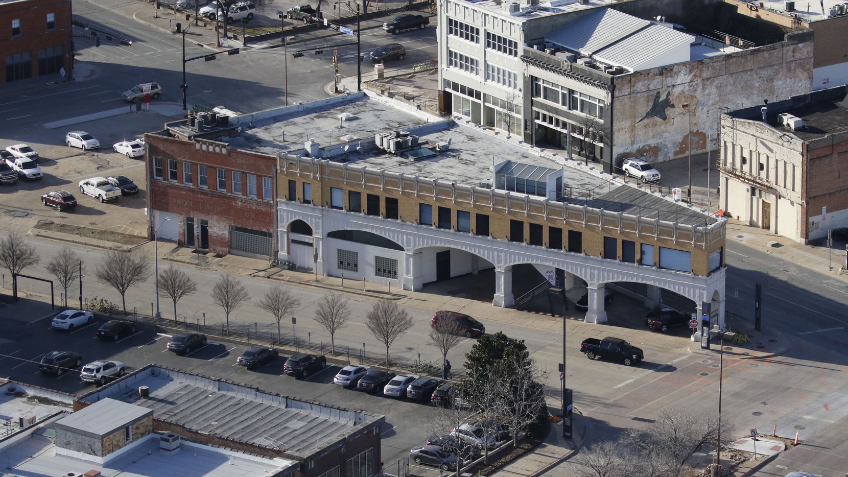 Todd Interests has completed its purchase of almost two dozen old buildings on downtown...