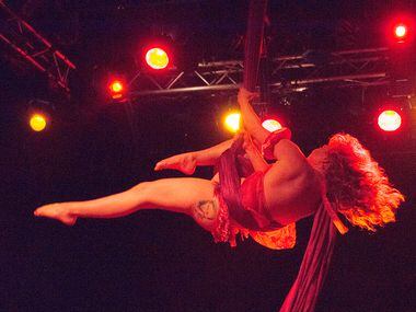 Bethany Summersizzle, who plays Clara in the ballet, swings from scarves at Trees in Deep...
