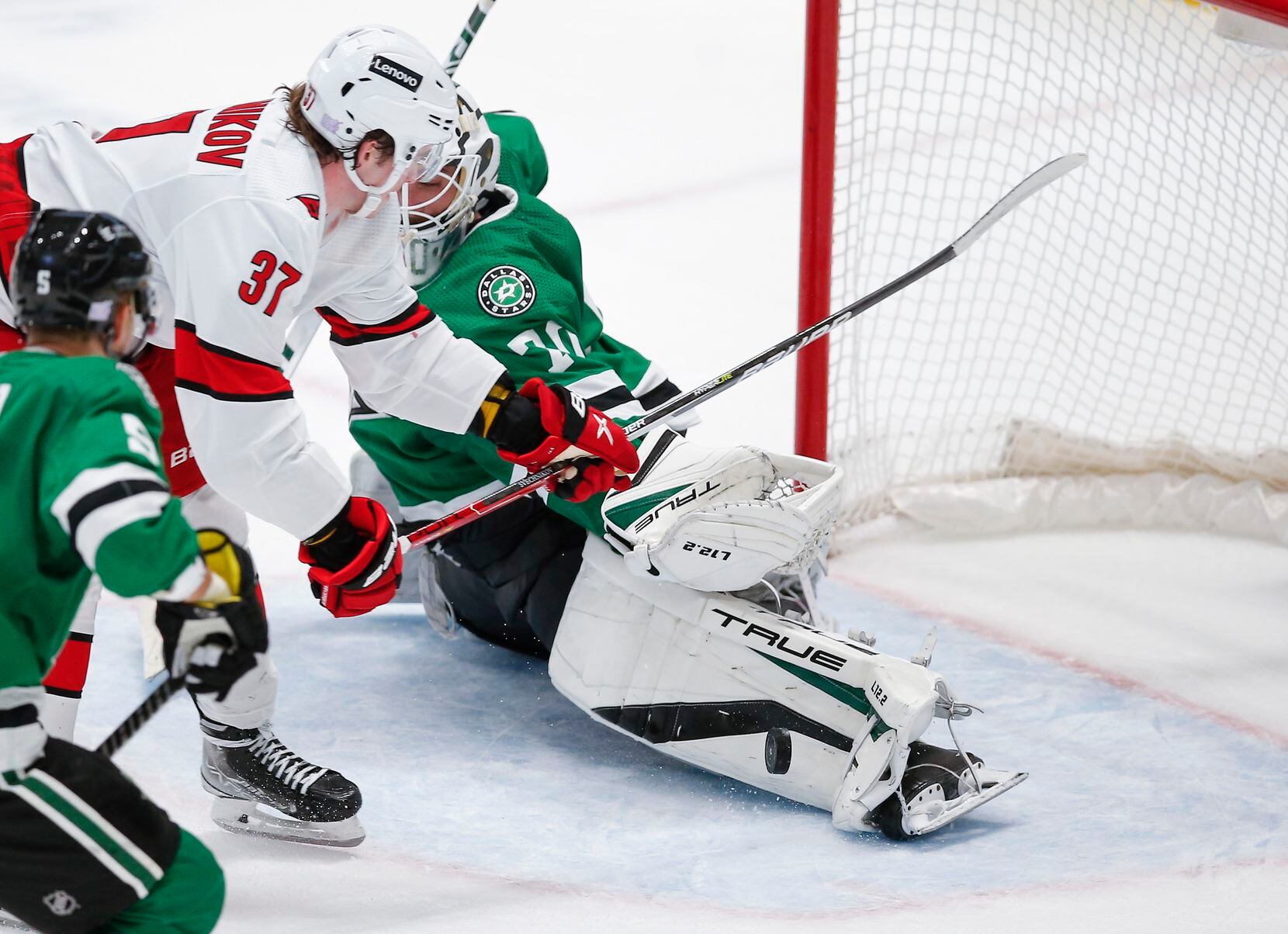 Dallas Stars goaltender Braden Holtby (70) stops a shot by Carolina Hurricanes forward Andrei Svechnikov (37) during the third period of an NHL hockey game in Dallas, Tuesday, November 30, 2021. Dallas won 4-1. (Brandon Wade/Special Contributor)
