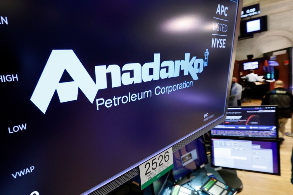 The logo for Anadarko Petroleum Corp. appears above a trading post on the floor of the New York Stock Exchange, Friday, April 12, 2019. Energy companies rallied after Chevron said it would pay $33 billion to buy rival Anadarko Petroleum. (AP Photo/Richard Drew)