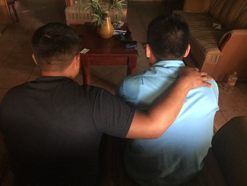 A brother consoles Francisco Narciso, who was kidnapped after being deported to Nuevo...