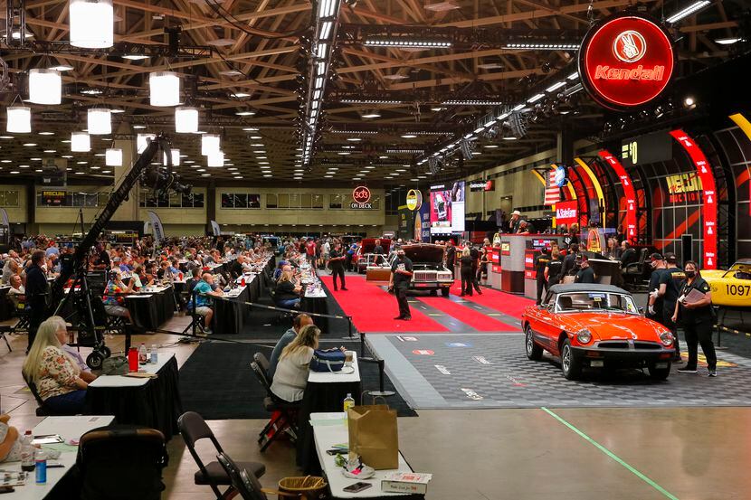 Bidders gathered at the Kay Bailey Hutchison Convention Center Thursday for Mecum Auctions'...