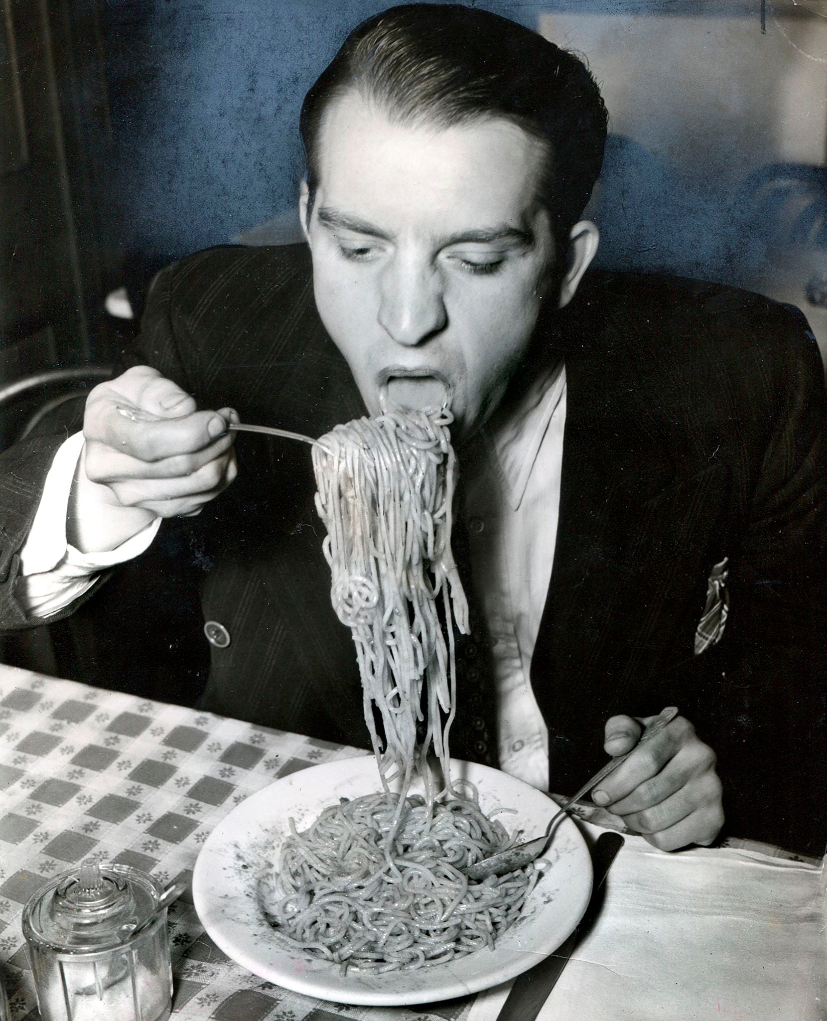 Weegee's 1940 image of Phillip J. Stazzone devouring his favorite food.
