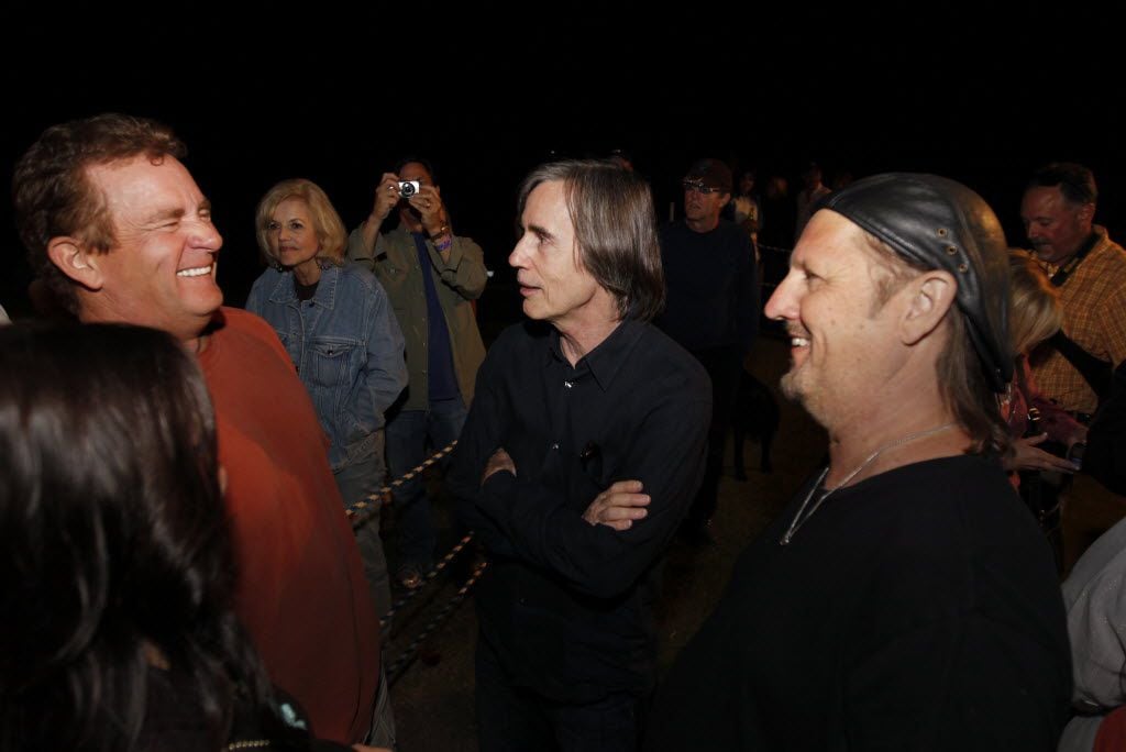 From left to right, Kelcy Warren, CEO of Energy Transfer Partners, Jackson Browne and Jimmy LaFave, a musician, chat with each other in the backstage after Jackson's show during the Cherokee Creek Music Festival in Cherokee, TX on May 14, 2011 This fifth annual festival is to benefit children's medical charities in Dallas. ( Kye R. Lee / The Dallas Morning News ) 10212012xNEWS