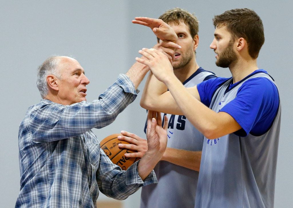 Holger Geschwindner works with Dallas Mavericks forward Maxi Kleber (42) as Dallas Mavericks forward Dirk Nowitzki (41) watches during training camp at the Dallas Mavericks practice facility in Dallas on Thursday, September 28, 2017. (Vernon Bryant/The Dallas Morning News)
