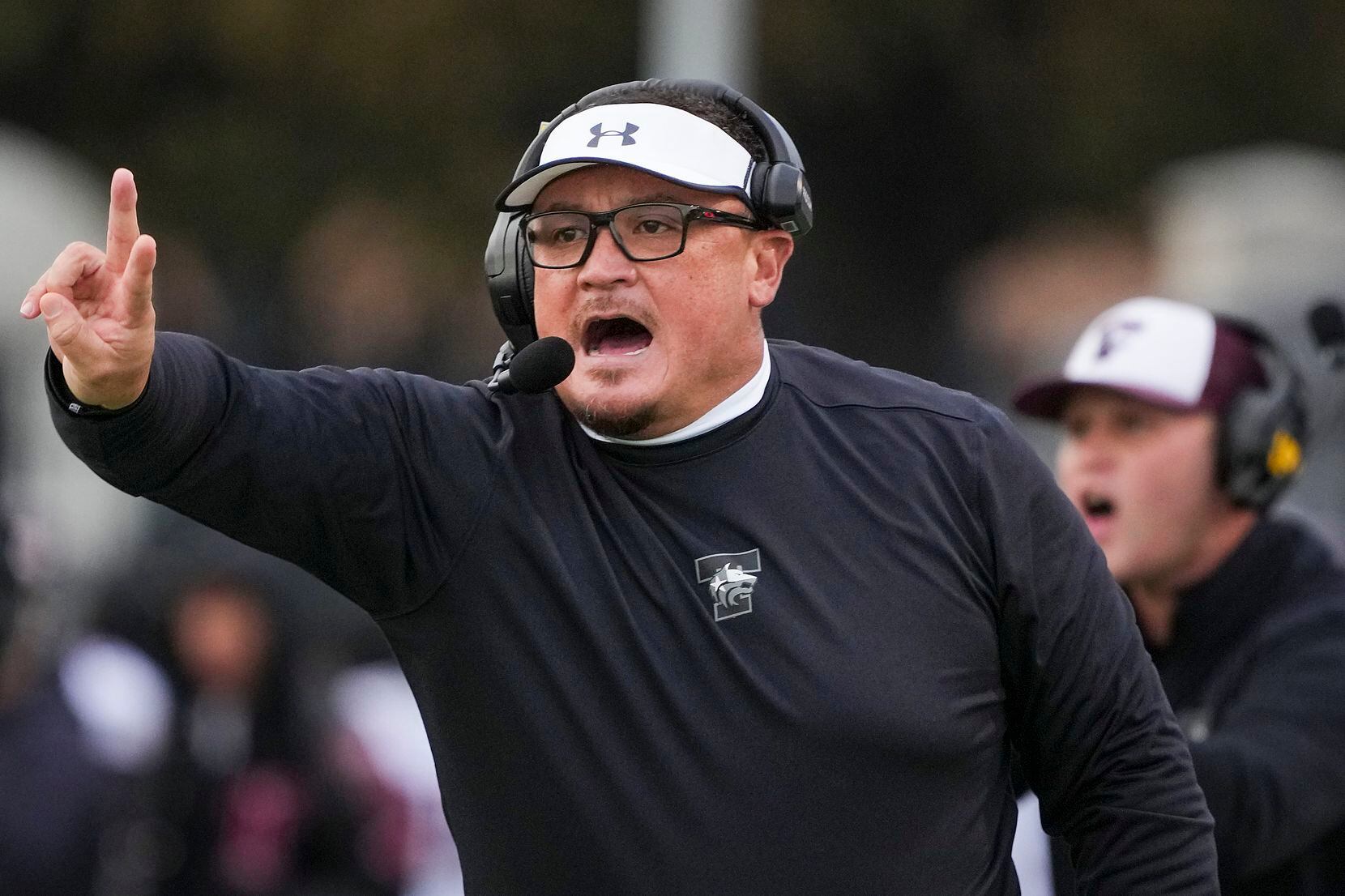 Mansfield Timberview head coach James Brown calls for a 2-point attempt after a touchdown...
