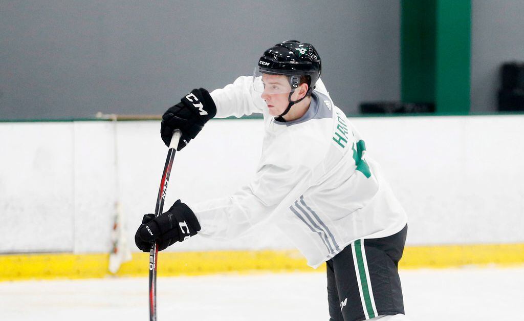 Dallas Stars Thomas Harley (5) attempts a shot on goal in a drill during the Dallas Stars prospect camp at Comerica Center in Frisco, Texas on Wednesday, June 26, 2019.