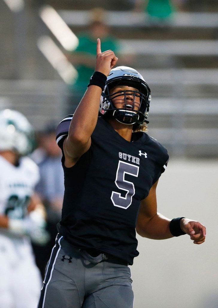 Denton Guyer's Eli Stowers (5) celebrates after a completed pass in a game against Southlake...