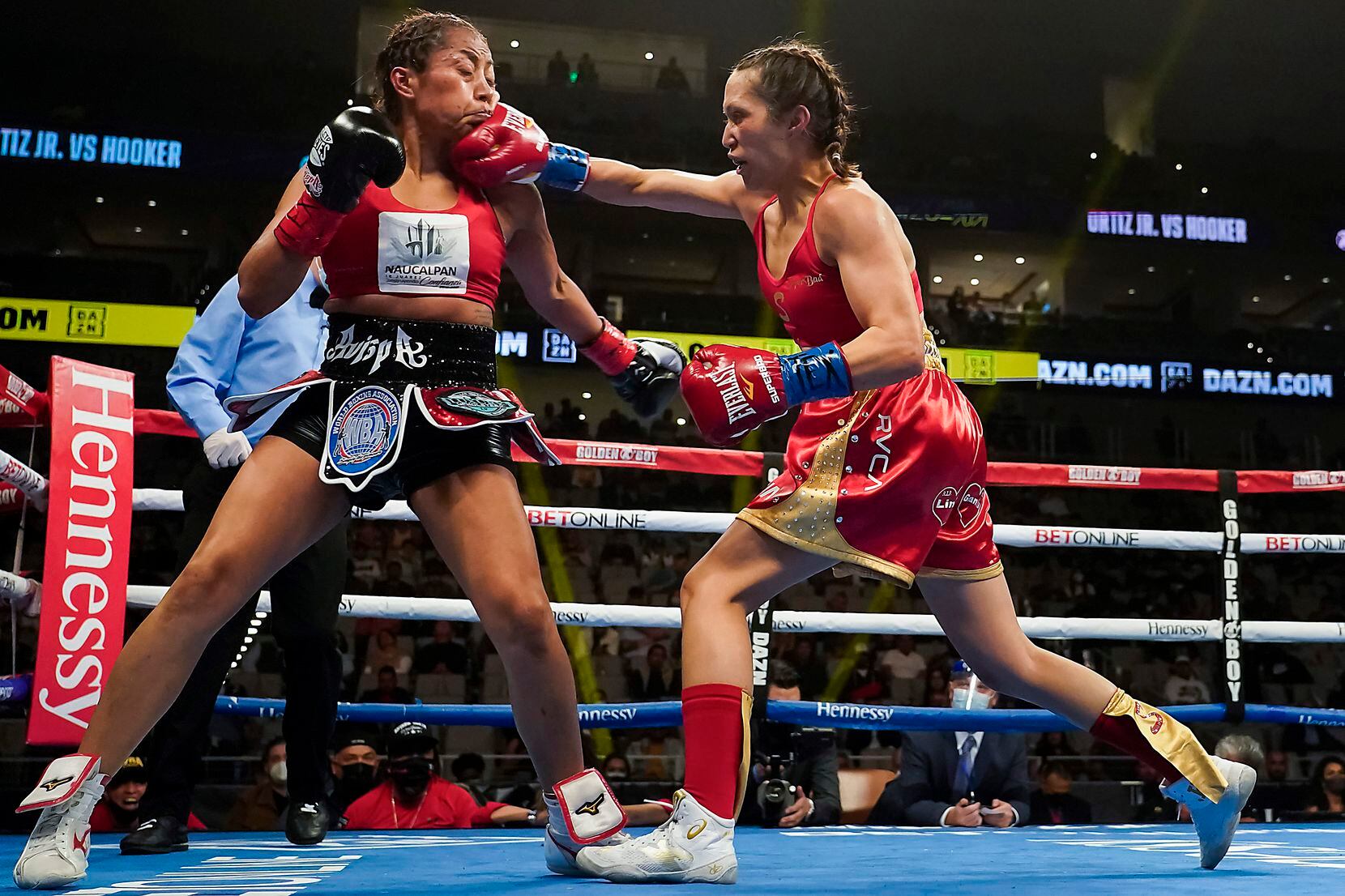 Seniesa Estrada lands a punch to the face of Anabel Ortiz as they fight for the WBA women’s strawweight title at Dickies Arena on Saturday, March 20, 2021, in Fort Worth.