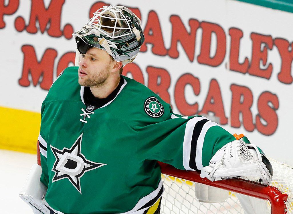 Dallas Stars goalie Antti Niemi (31) reacts after being scored on by New York Islanders...