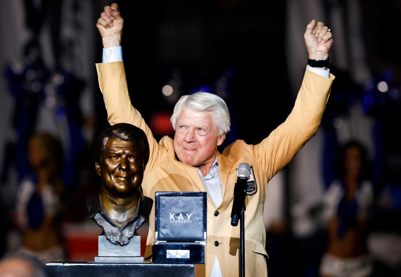 Former Dallas Cowboys head coach and Pro Football Hall of Famer Jimmy Johnson raises his arms after yelling "How 'bout them Cowboys!" during his Hall ring ceremony speech at AT&T Stadium in Arlington, Monday, September 27, 2021. (Tom Fox/The Dallas Morning News)