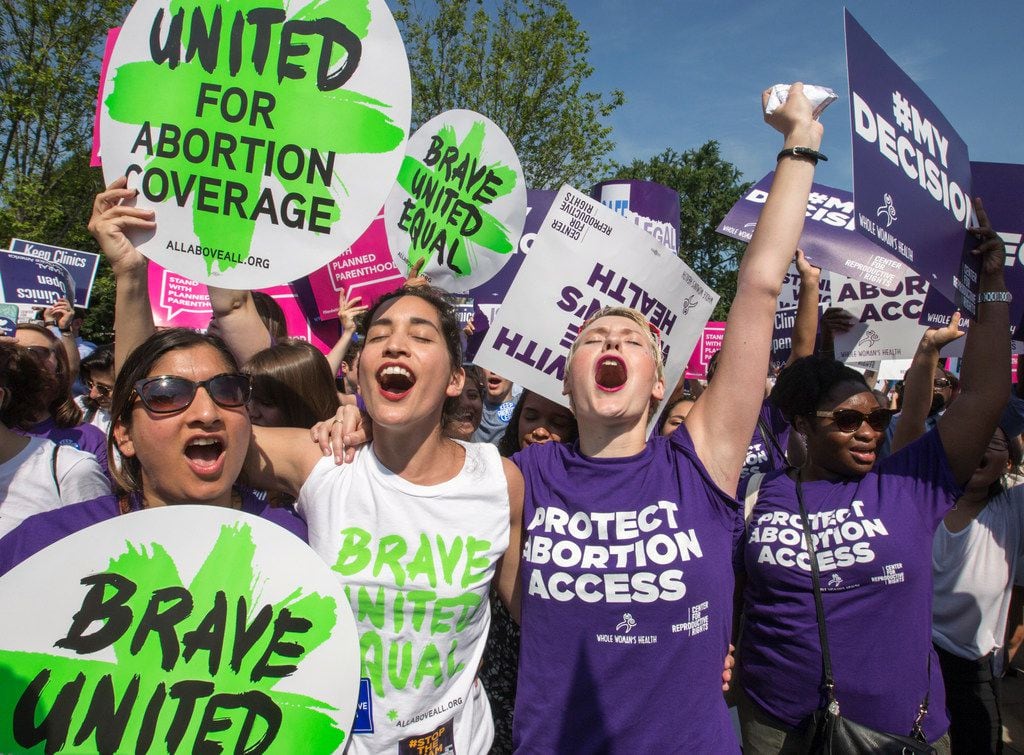 In this June 27, 2016, file photo, abortion rights activists rejoice in front of the Supreme...