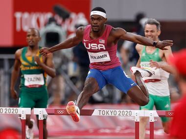 USA’s Rai Benjamin runs in the 400 meter hurdles semifinal during the postponed 2020 Tokyo...