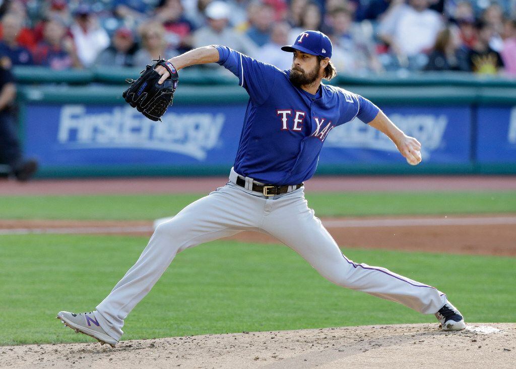 Texas Rangers starting pitcher Cole Hamels delivers in the first inning of a baseball game against the Cleveland Indians, Monday, June 26, 2017, in Cleveland. (AP Photo/Tony Dejak)