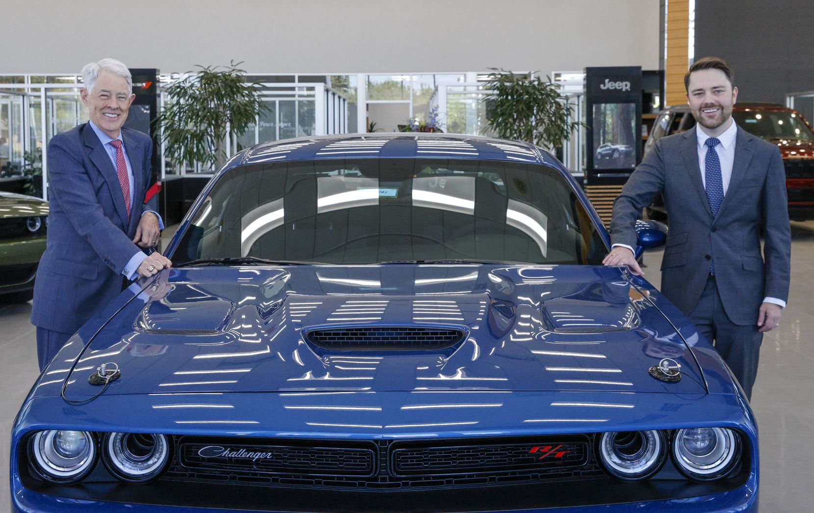 Owner Ray Huffines (left) and his son and general manager Sam Huffines at Huffines Chrysler...