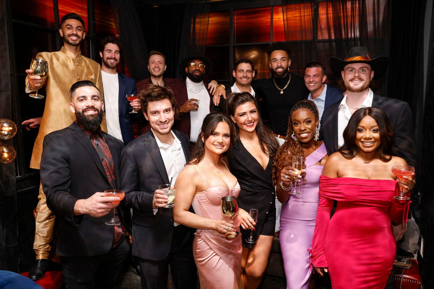 Love is Blind cast members toast during a watch party for the premiere of Love is Blind...