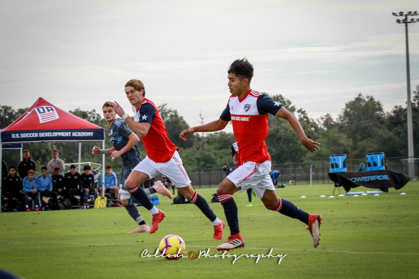 Gibran Rayo on the ball for the FC Dallas U19s, Tanner Tessmann runs to his right at the...