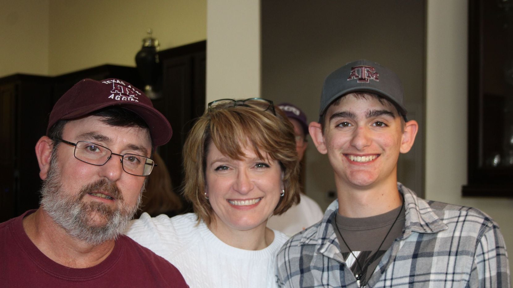 Will Brannon of Hallsville, Texas, died in 2017 when he was 17 in a sailing accident. His mast hit a sagging power line. He and two fellow Boy Scouts were electrocuted. Will's parents, Stan and Michelle. shown here with Will, led a fight to get a new law passed, and it did. But then they say the PUC ignored it.