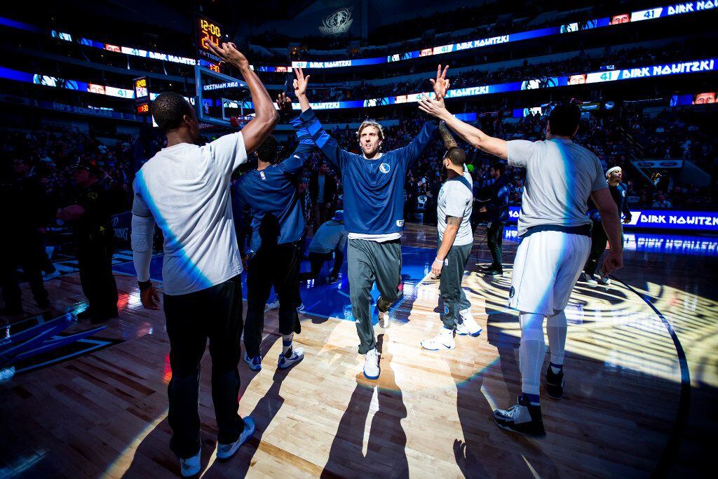 Dallas Mavericks forward Dirk Nowitzki takes the court before an NBA basketball game against...