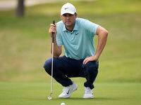 Scottie Scheffler lines up his putt on the fifth hole during the second round of the Dell...