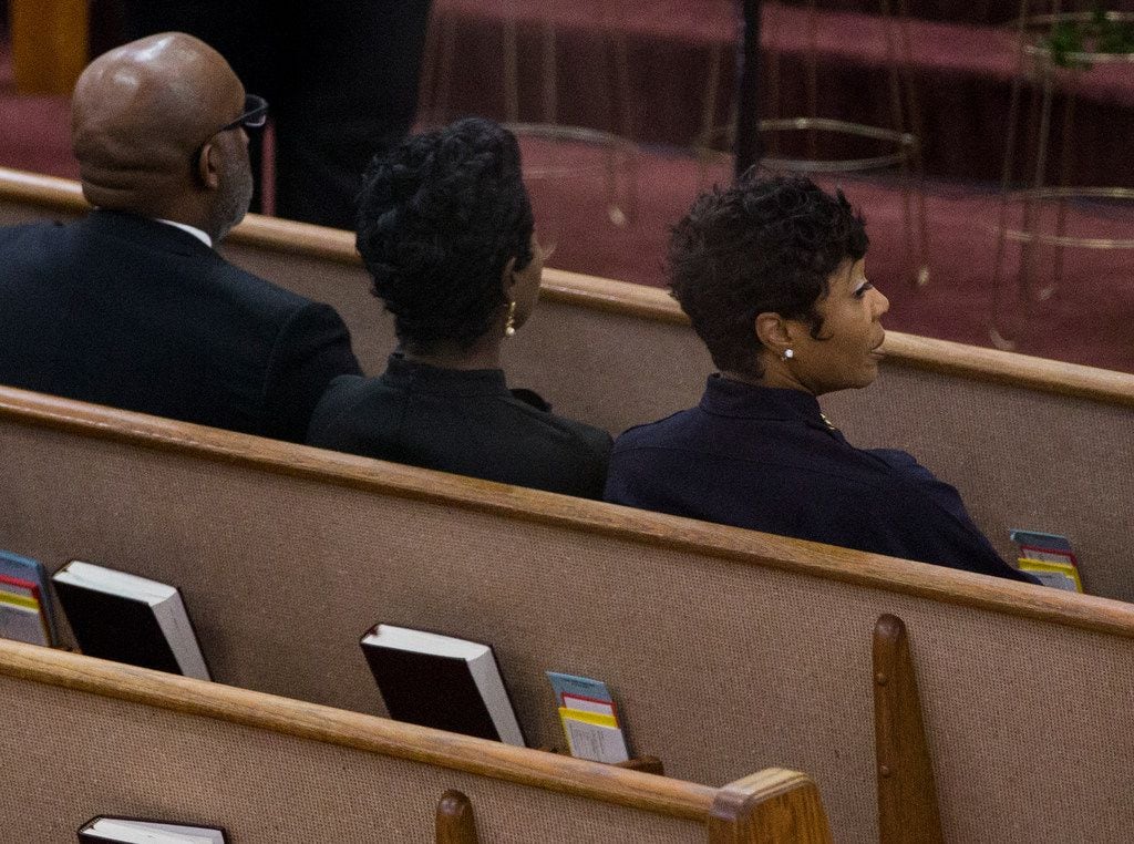 Dallas Police Chief U. Renee Hall, right, with City Manager T.C. Broadnax and his chief of staff Kim Tolbert at the public viewing before the funeral of Botham Shem Jean at the Greenville Avenue Church of Christ on September 13,