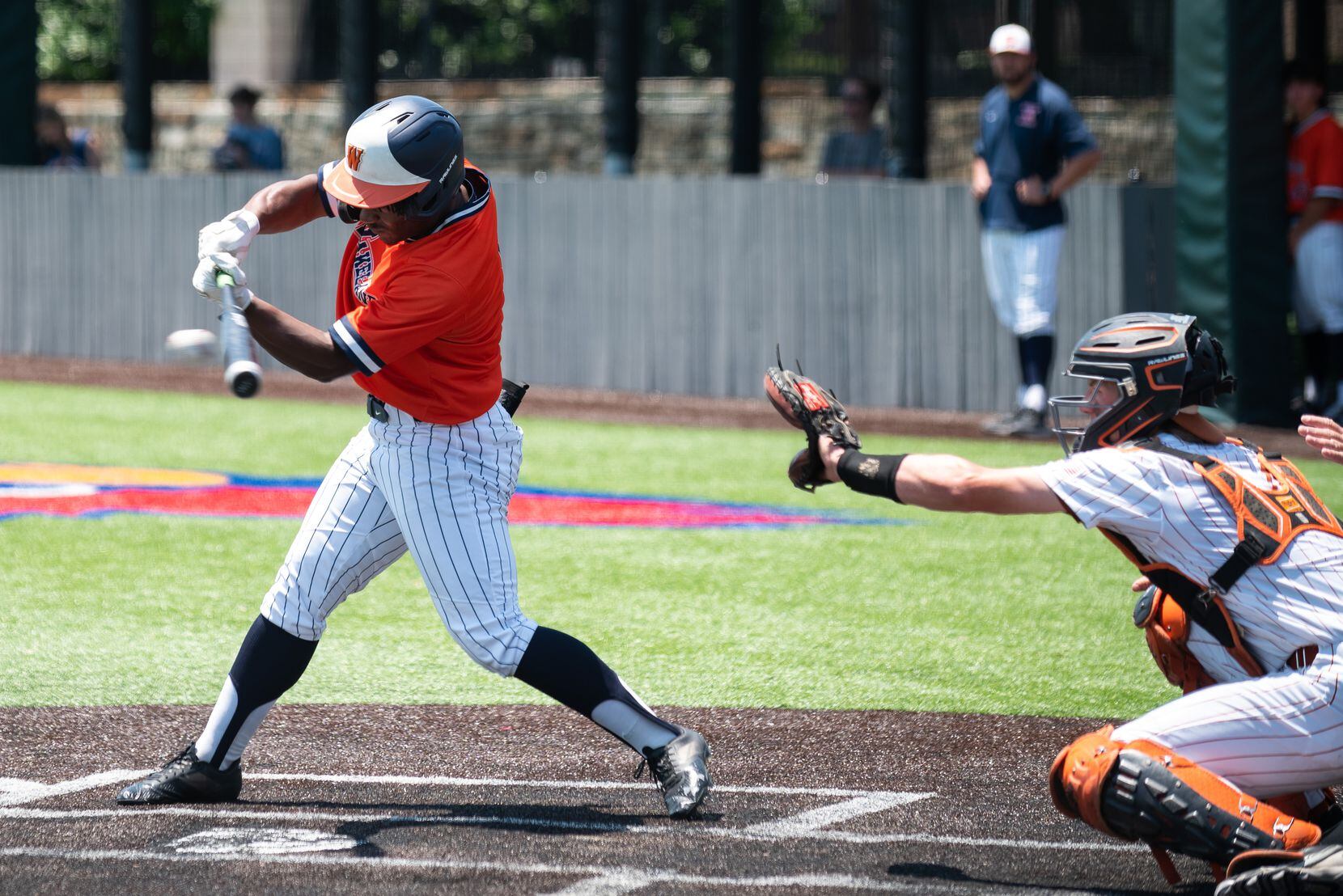 Frisco Wakeland's Addison Brown (1) connects on a hit versus W.T. White during game 2 of a...
