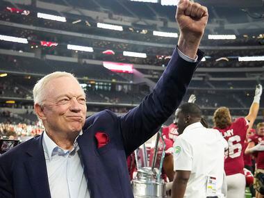 Dallas Cowboys owner and general manager Jerry Jones celebrates after Arkansas defeated...