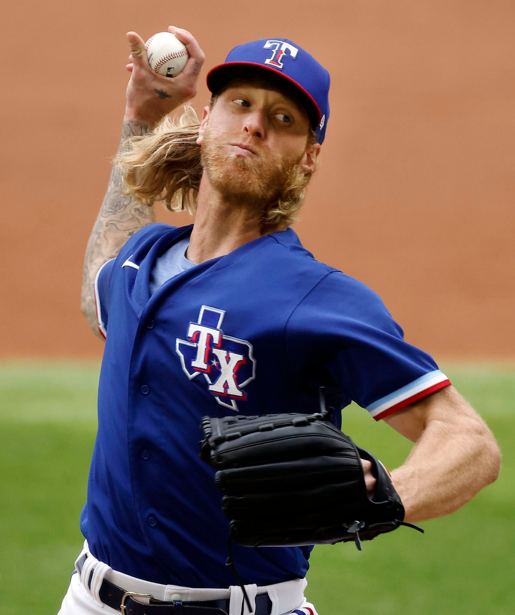 Texas Rangers starting pitcher Mike Foltynewicz (20) throws against the Milwaukee Brewers in the third inning at Globe Life Field in Arlington, Texas. The teams were playing in an exhibition game, Tuesday, March 30, 2021. (Tom Fox/The Dallas Morning News)