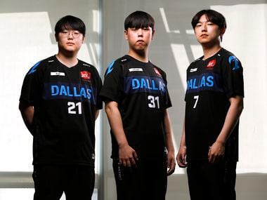 Dallas Fuel Overwatch League players Seung-soo ‘Jecse’ Lee, Kwon ‘Fielder’ Jun, and Jun Keun ‘Rapel’ Kim pose for a photo at Envy Gaming Headquarters in Dallas, Monday, March 29, 2021.