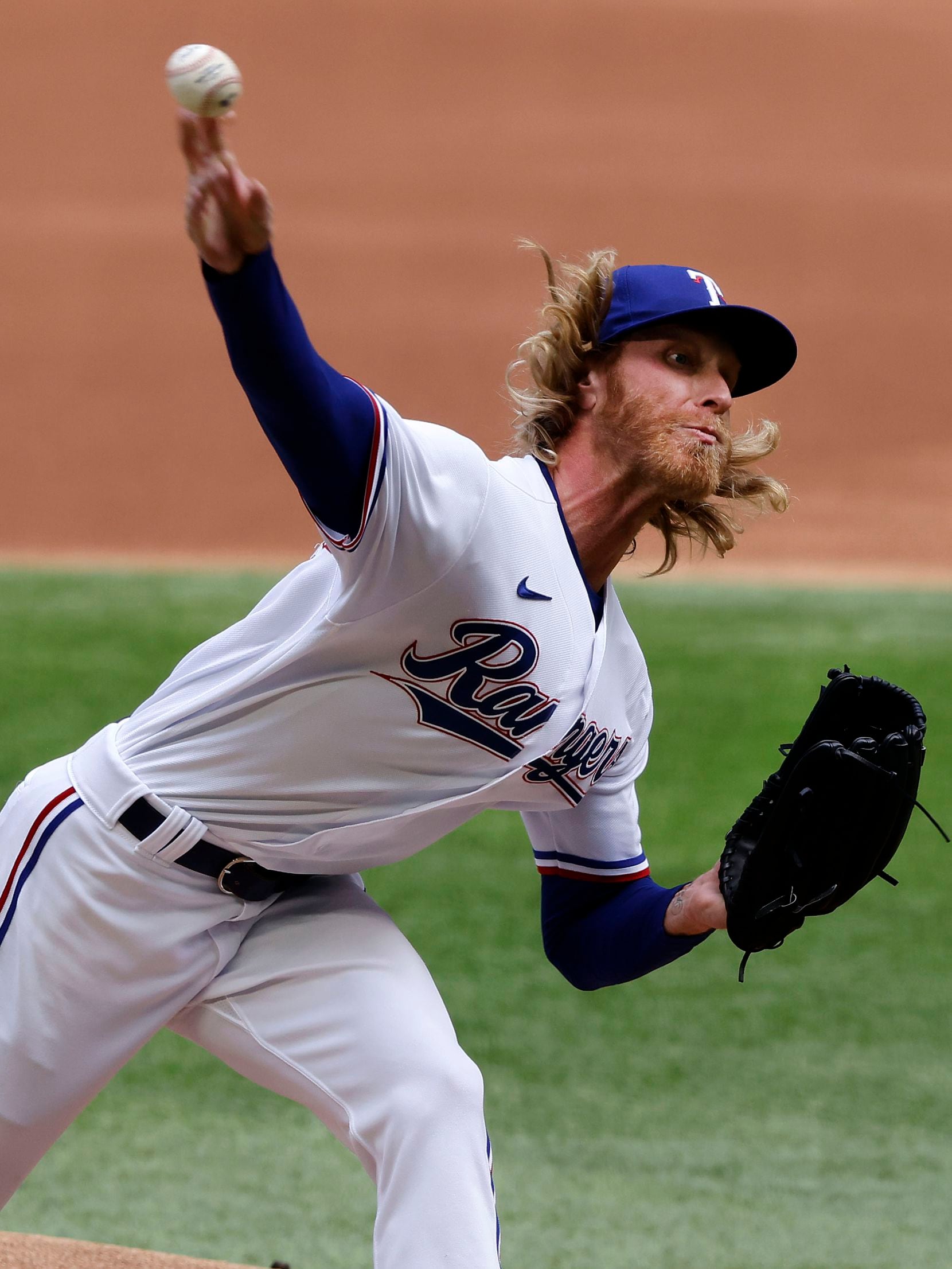 Texas Rangers starting pitcher Mike Foltynewicz (20) throws against the Toronto Blue Jays in the first inning at Globe Life Field in Arlington, Monday, April 5, 2021. The Texas Rangers were facing the Toronto Blue Jays in their home opener. (Tom Fox/The Dallas Morning News)
