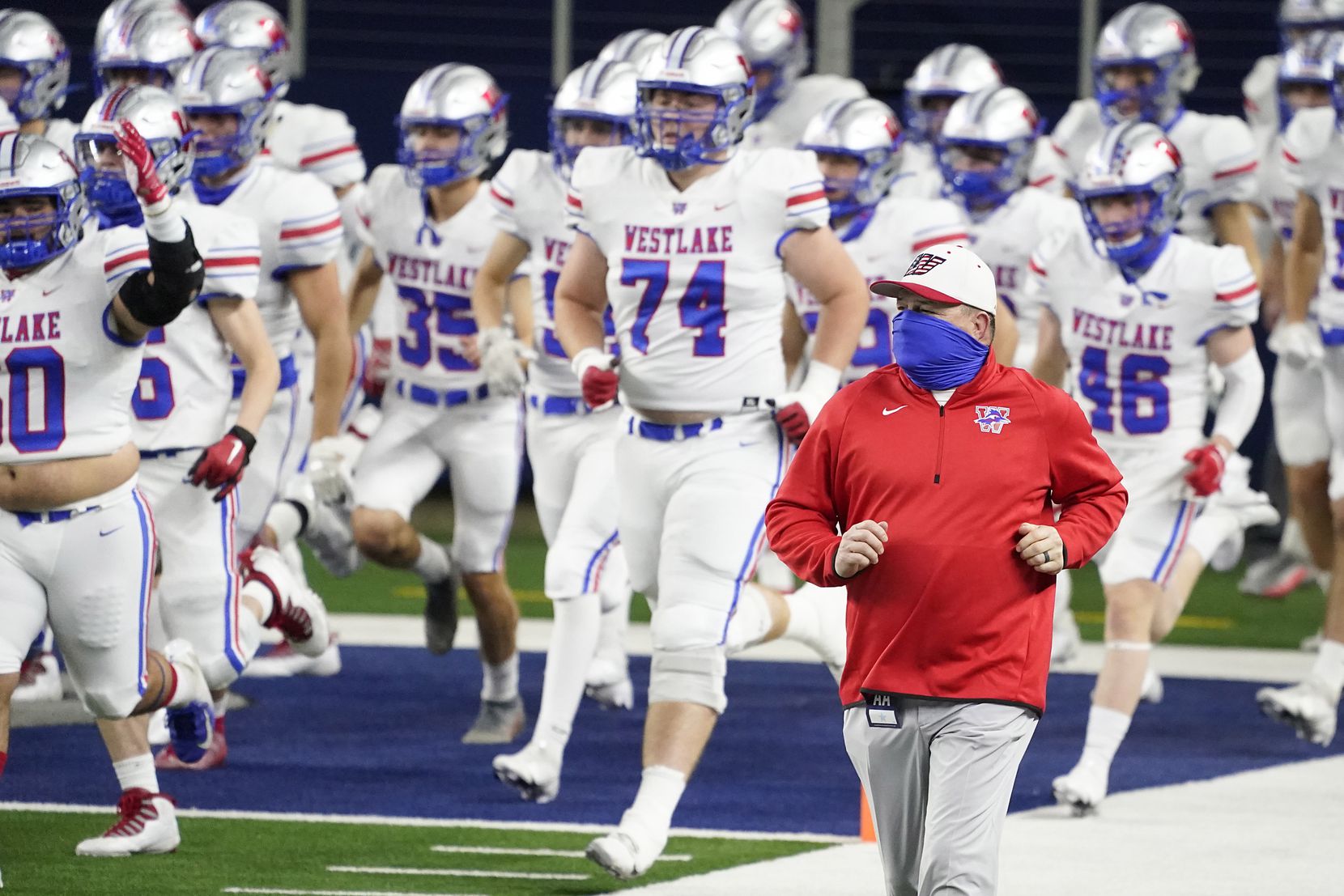Austin Westlake head coach Todd Dodge takes the field with his team for the Class 6A Division I state football championship game against Southlake Carroll  at AT&T Stadium on Saturday, Jan. 16, 2021, in Arlington, Texas.