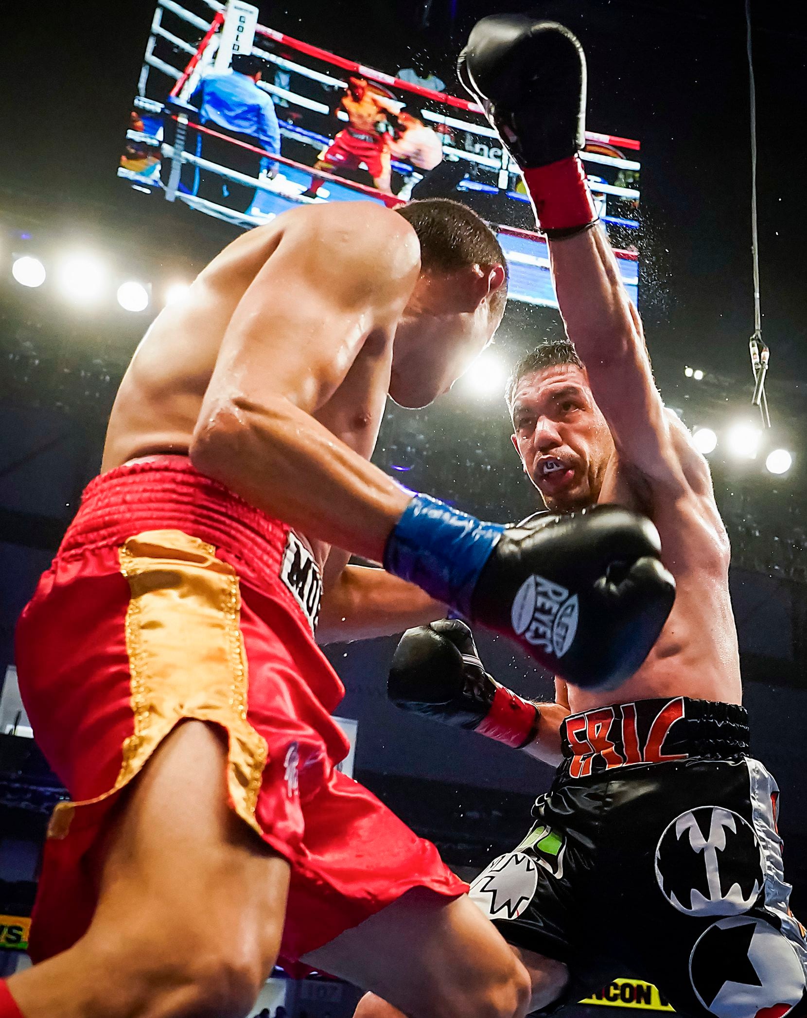 George Rincon (right) fights Luis Solis in a super lightweight bout at Dickies Arena on Saturday, March 20, 2021, in Fort Worth.