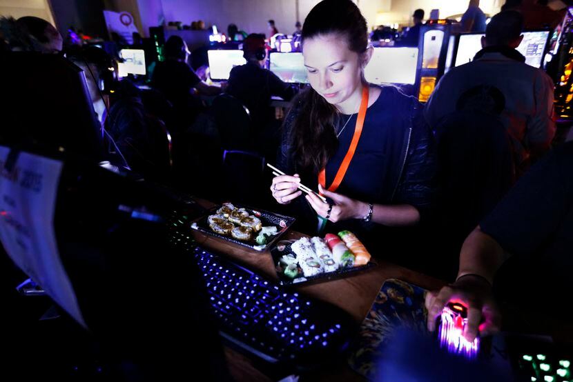Megan "Sakiana" Bailey had sushi delivered to the BYOC hall as she plays World of Warcraft...