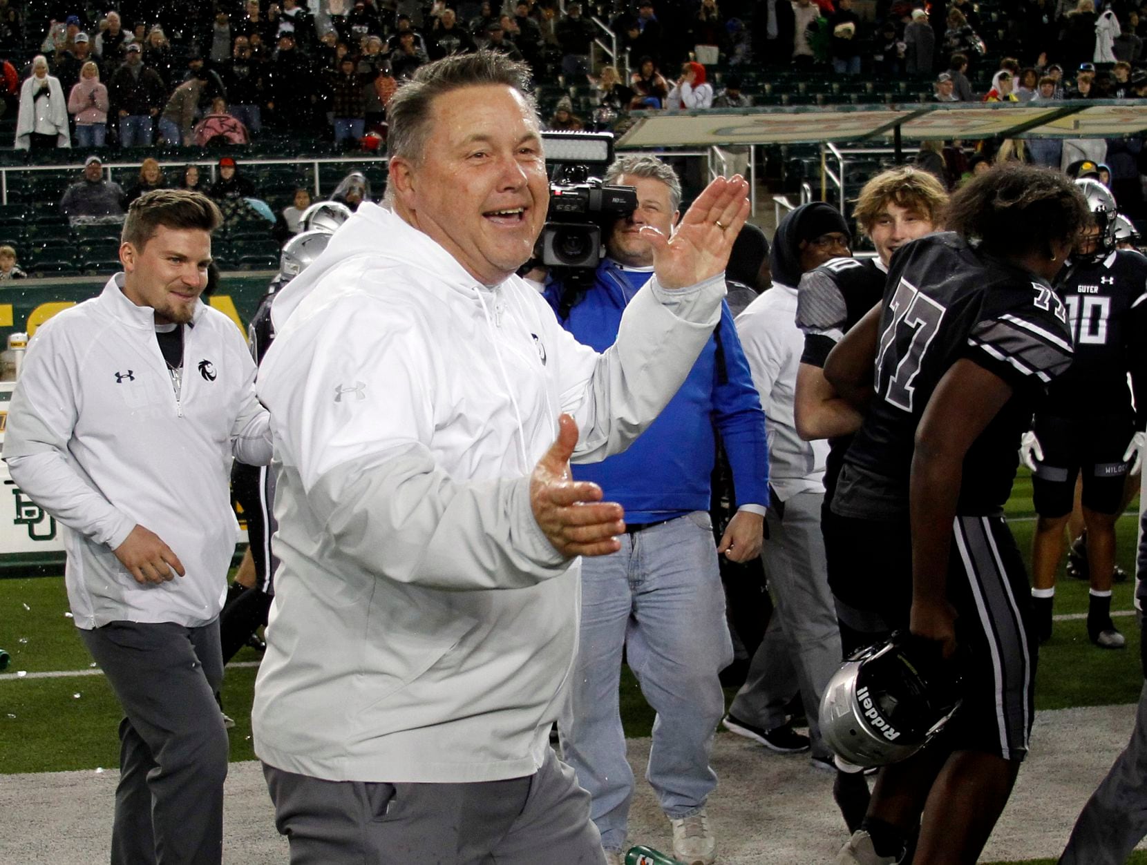 Denton Guyer head coach Rodney Webb was all smiles as time expired in their 59-14 victory...