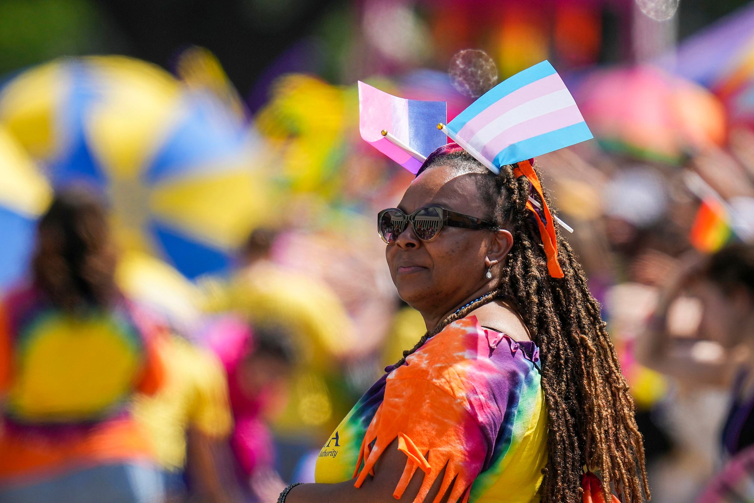 Participants march during the annual Alan Ross Texas Freedom Parade celebrating Pride Month...