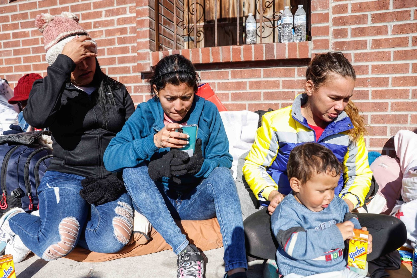 From left, Isabel, Elueska and Isneidys with her sun Nehemias, 2, migrants from Venezuela,...