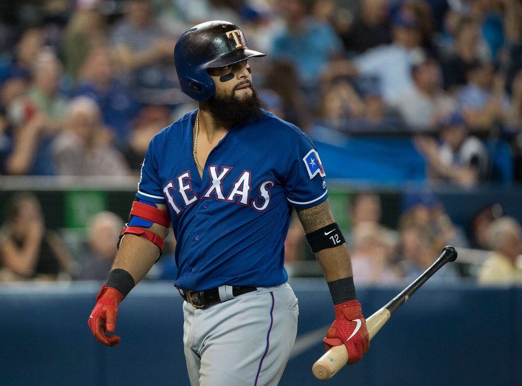 Texas Rangers second baseman Rougned Odor looks back after striking out against the Toronto...
