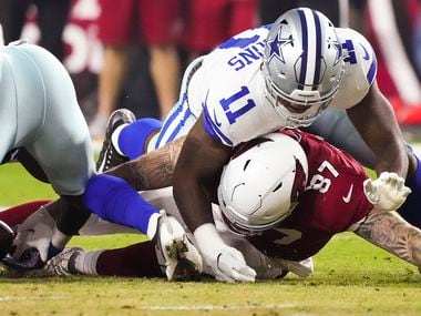 Dallas Cowboys linebacker Micah Parsons (11) falls on Arizona Cardinals tight end Maxx Williams (87) as linebacker Keanu Neal recovers a fumble in the first quarter of a football game in the NFL at State Farm Stadium on Friday August 13, 2021, in Glendale, Arizona. 