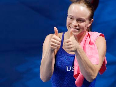 USA’s Krysta Palmer is all smiles after completing her last dive in the women’s 3 meter...