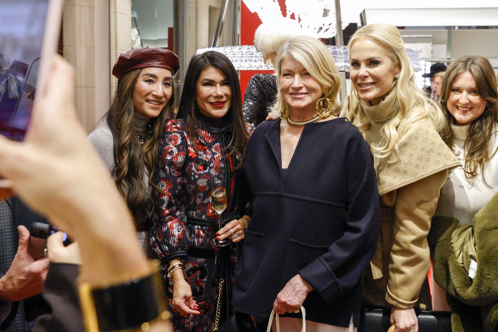 Neiman Marcus customers took selfies with Martha Stewart (center), including Kameron...