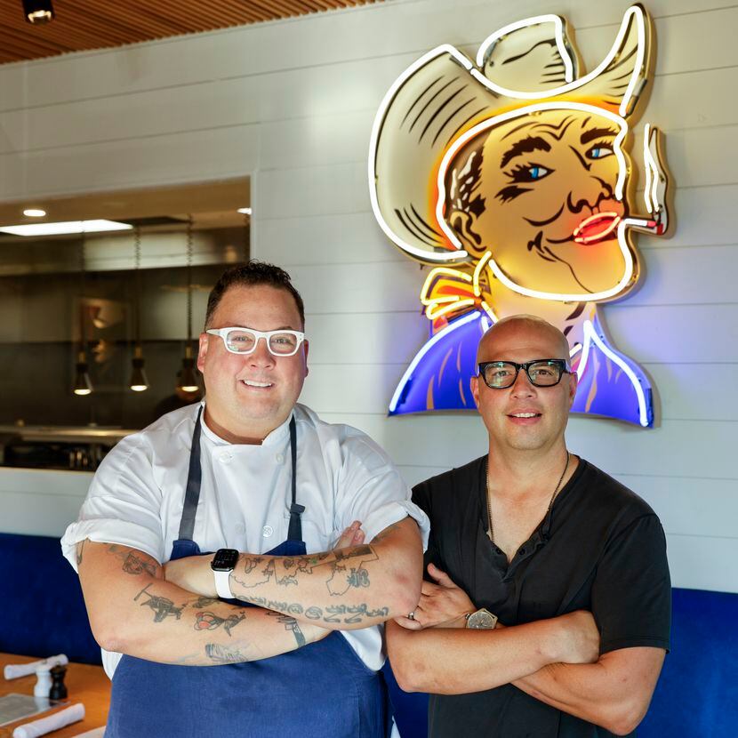 Chef Graham Elliot (left) and owner Felipe Armenta stand in the main dining room at F1...