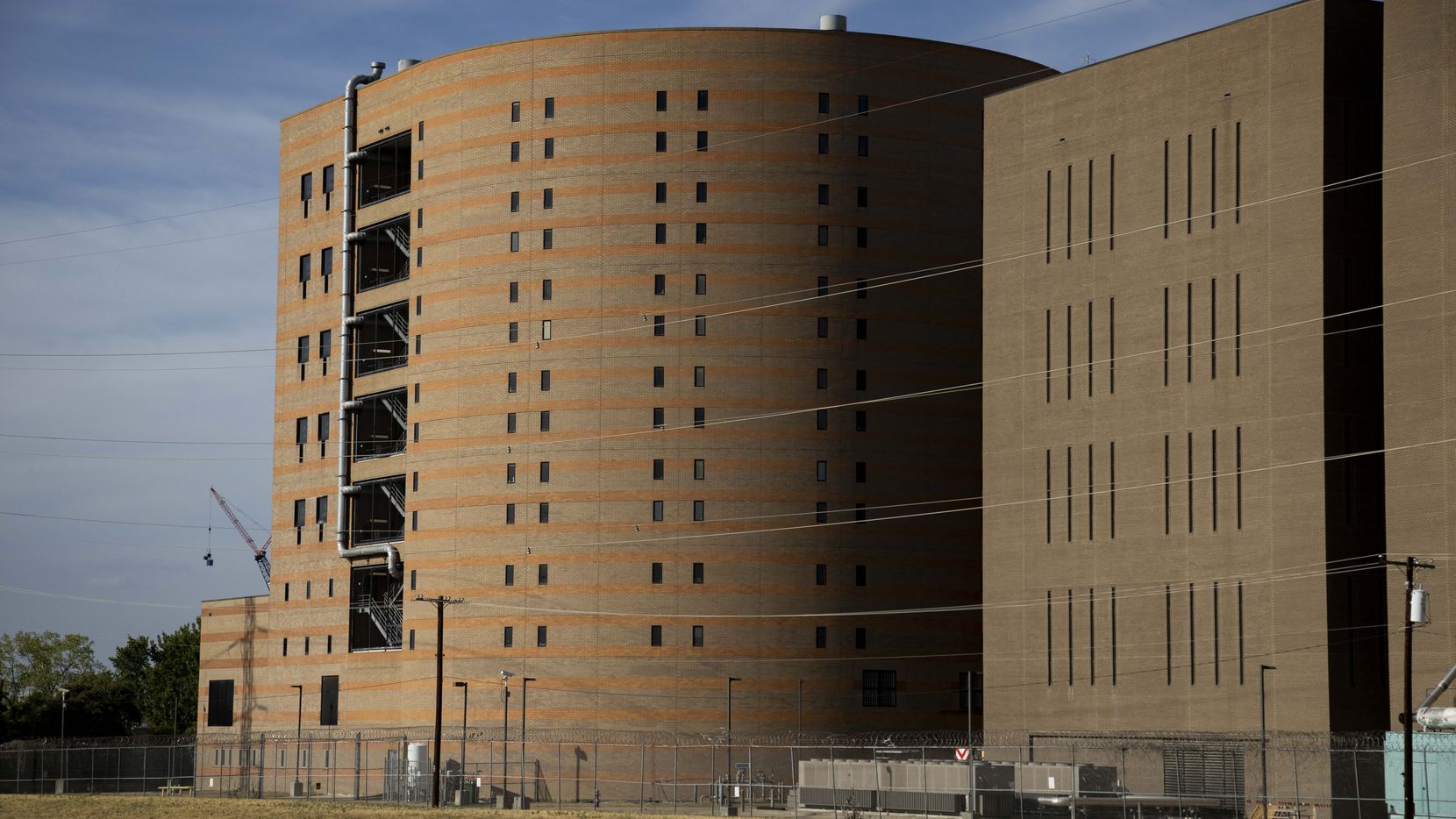 The North Tower Detention Facility (left) as part of the Lew Sterrett Justice Center...